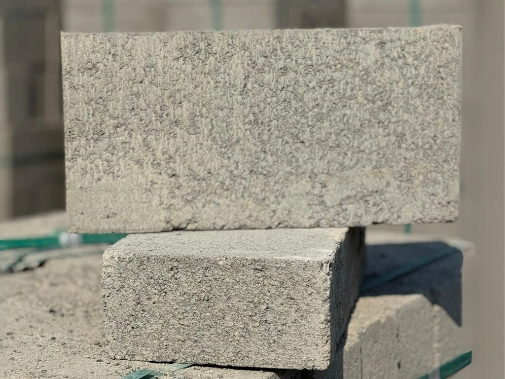 Close-up view of 4-inch solid block manufactured by Ashok Concrete