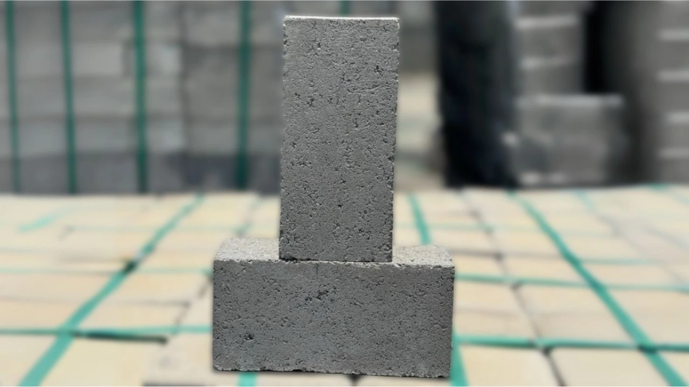 Close-up of two concrete blocks solid blocks from Ashok Concrete stacked for product display